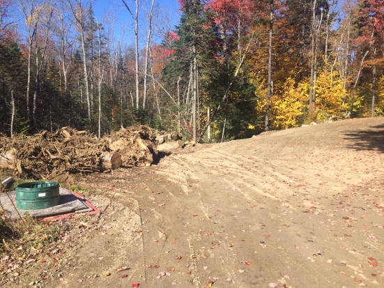 And, to finish the autumn intrusions, we expanded the parking lot across the road and burned most of the debris piles that were there before. 